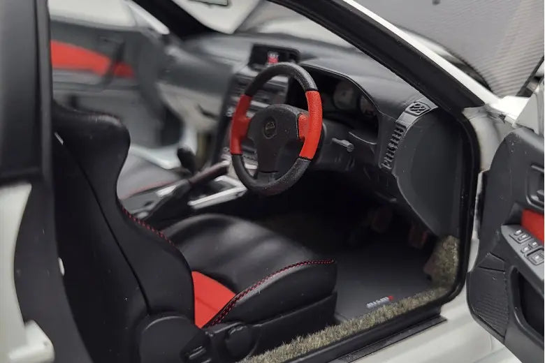 Nissan Skyline GT-R R34 Nismo Z-Tune White Motorhelix 1/18